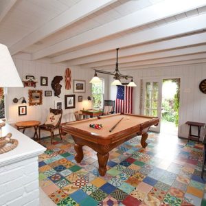 Game Room Image with pool table, white painted walls, nice looking furnitures and decors